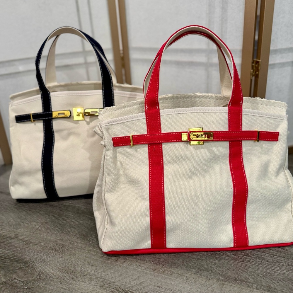 Neutral Canvas Tote with Navy Trim and Gold Hardware - Picture 2 of 6